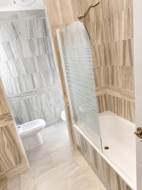 Second bathroom with bath