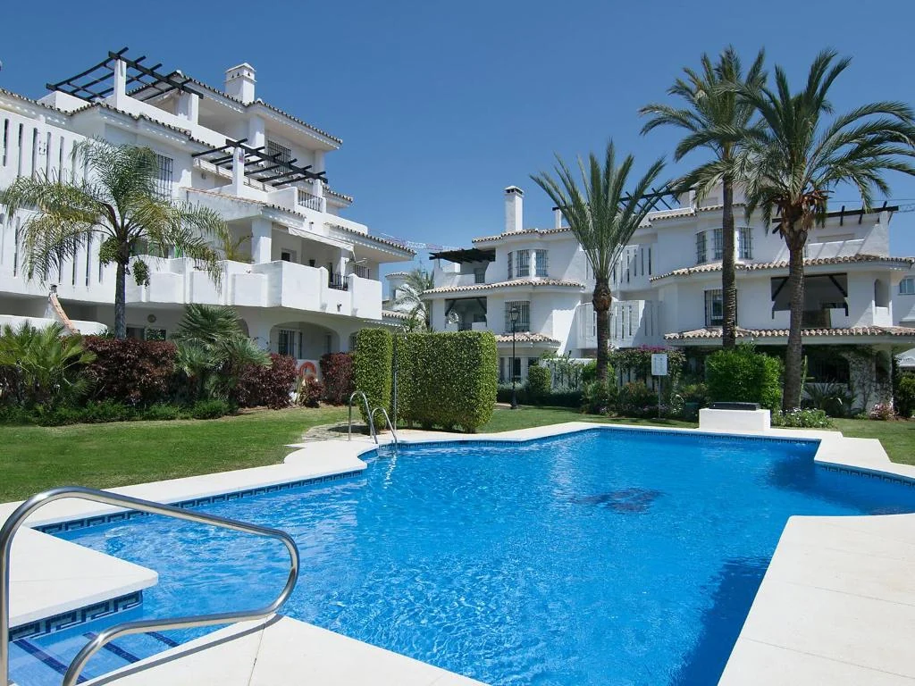 Swimming pool and gardens at Los Naranjos de Marbella